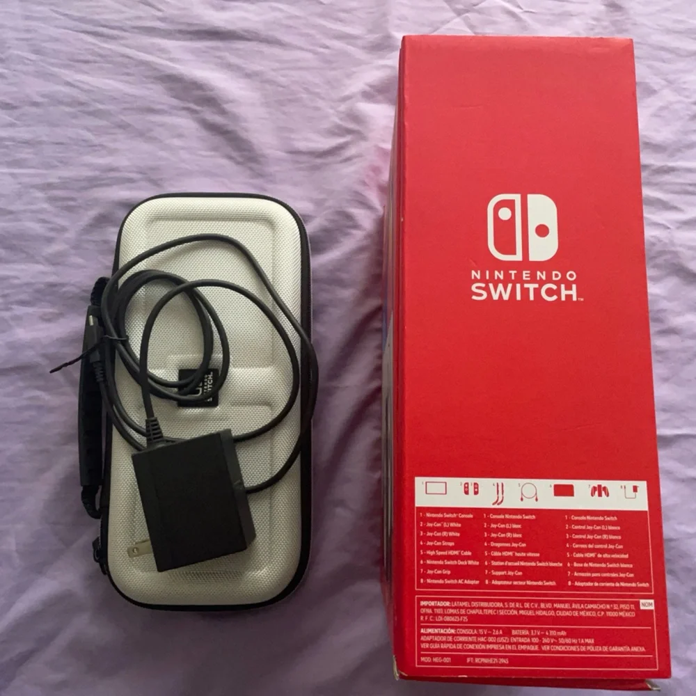 Nintendo Switch with Gray Joy-Con and Accessories